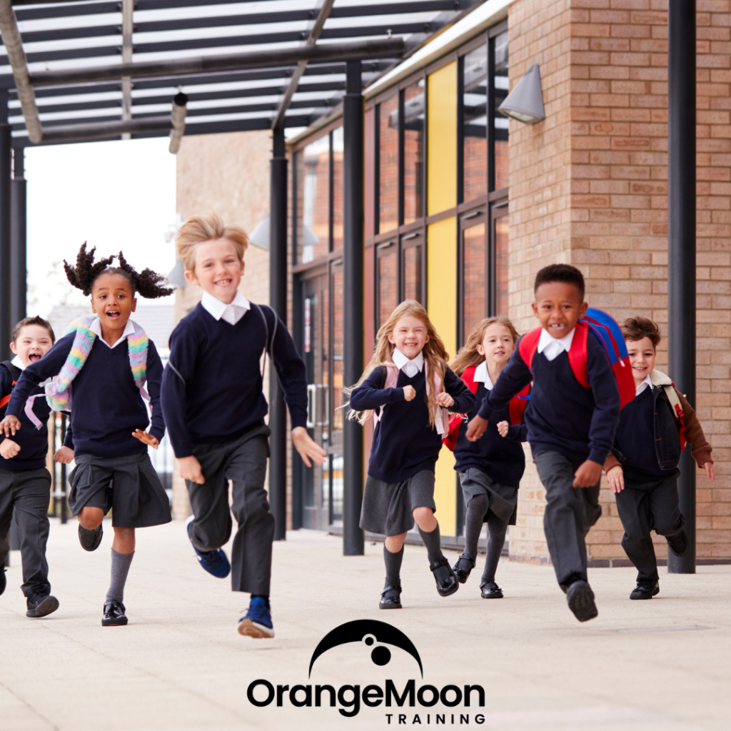 school children running outside