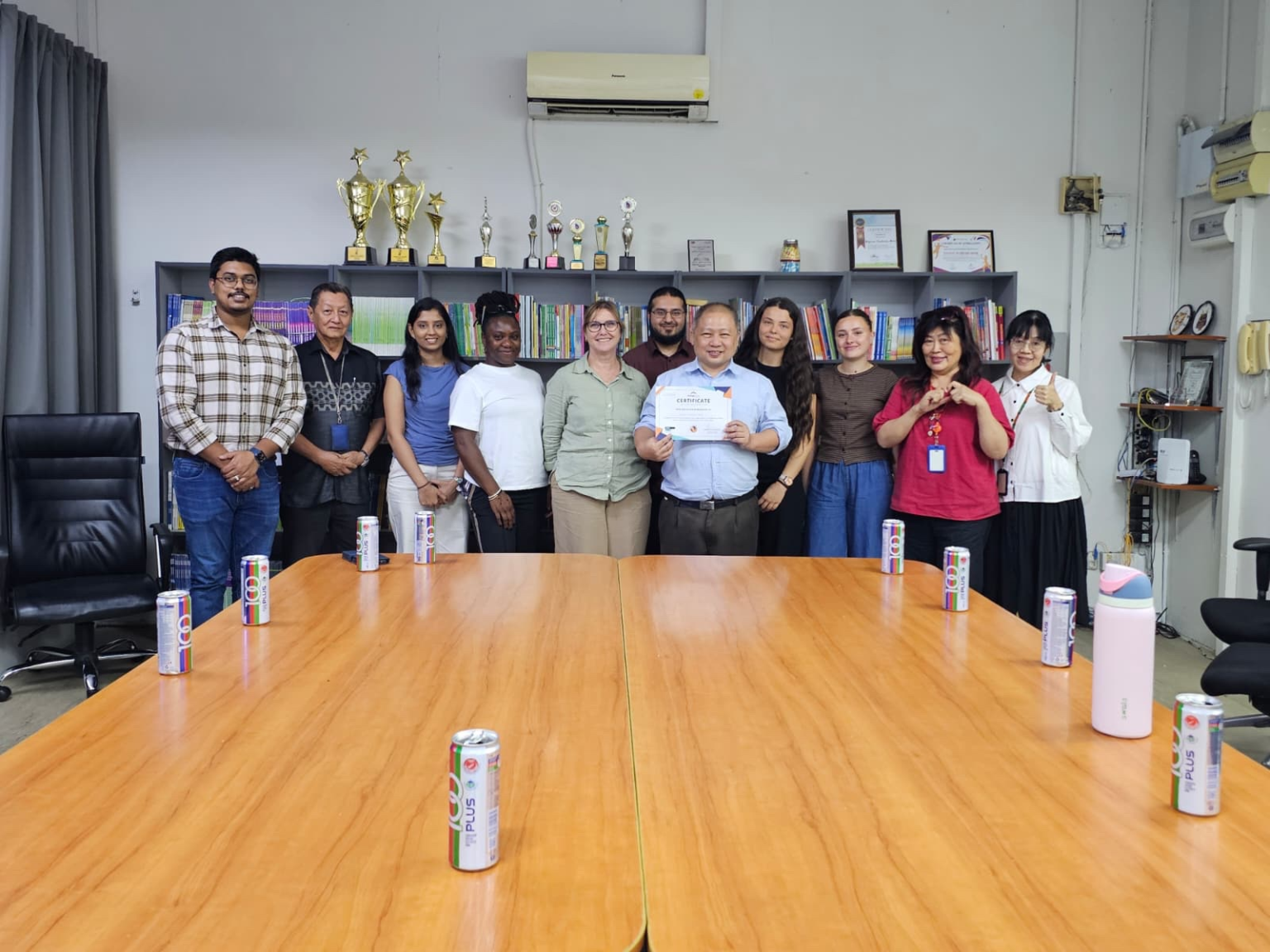 Meeting with staff in Malaysia with learners from Orange Moon Training