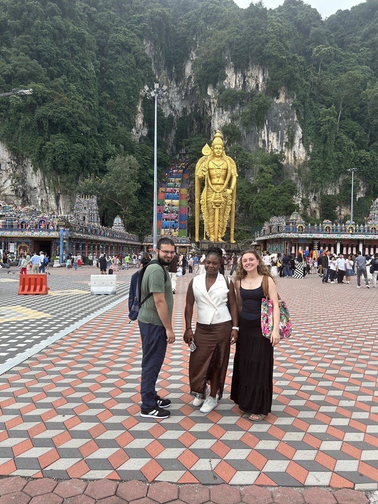 Orange Moon Training learners visiting the Batu Caves in Kuala Lumpur, Malaysia.